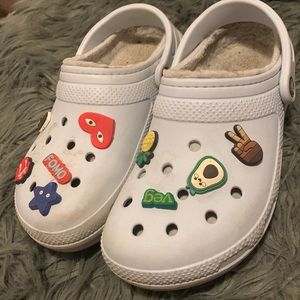 Crocs! size 7 in women,5 in men. light blue colour. + the charms